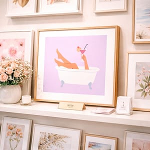 Retro bathtub printable wall art displayed in a gallery wall setting with multiple frames and modern home decor style